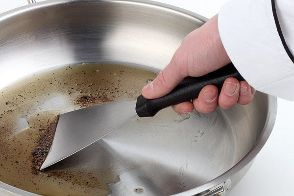 Stainless steel kitchen spatula with plastic handle